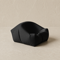3CHIC The Pod earbuds stand in Black plant-based PLA on a desk, Small Size