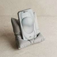 3CHIC The Pillow phone stand in Grey plant-based PLA on a desk