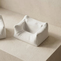 3CHIC The Couch phone and earbuds stand in White plant-based PLA on a desk