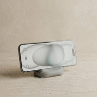 3CHIC The Sofa phone stand in Grey plant-based PLA, Phone size, holding a smartphone