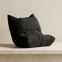 3CHIC The Pillow phone stand in Black plant-based PLA holding a smartphone