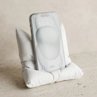 3CHIC The Pillow phone stand in White plant-based PLA holding a smartphone